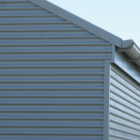 Exterior of shed cladded with Metrospan.